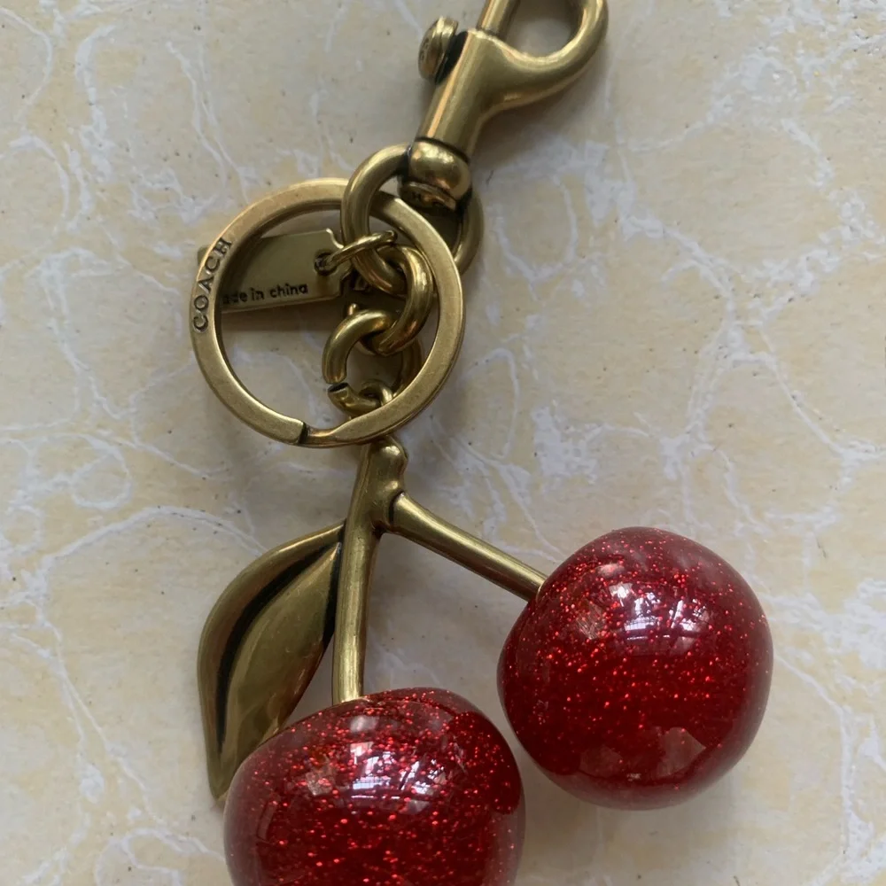 Coach Gold-Tone Keychain with Red Glitter Cherry Charm